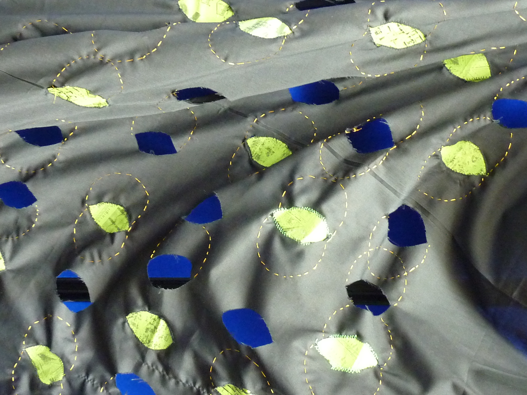 The Aggregate Accessory — Close up of detail on fabric